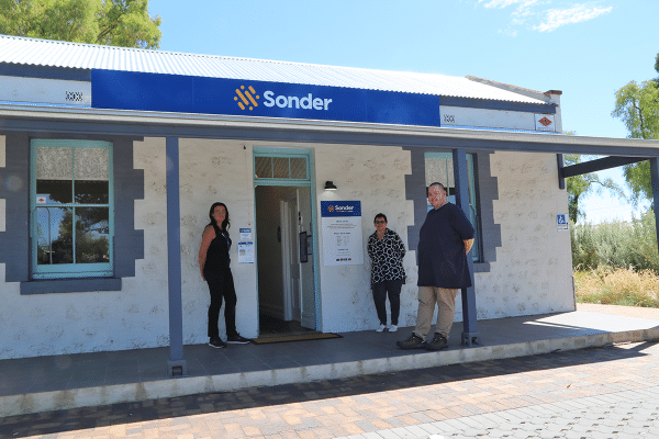 3 staff members standing out the front of the Sonder Galwer centre.