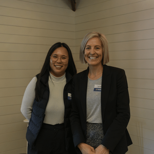 Two people standing side-by-side facing the camera.