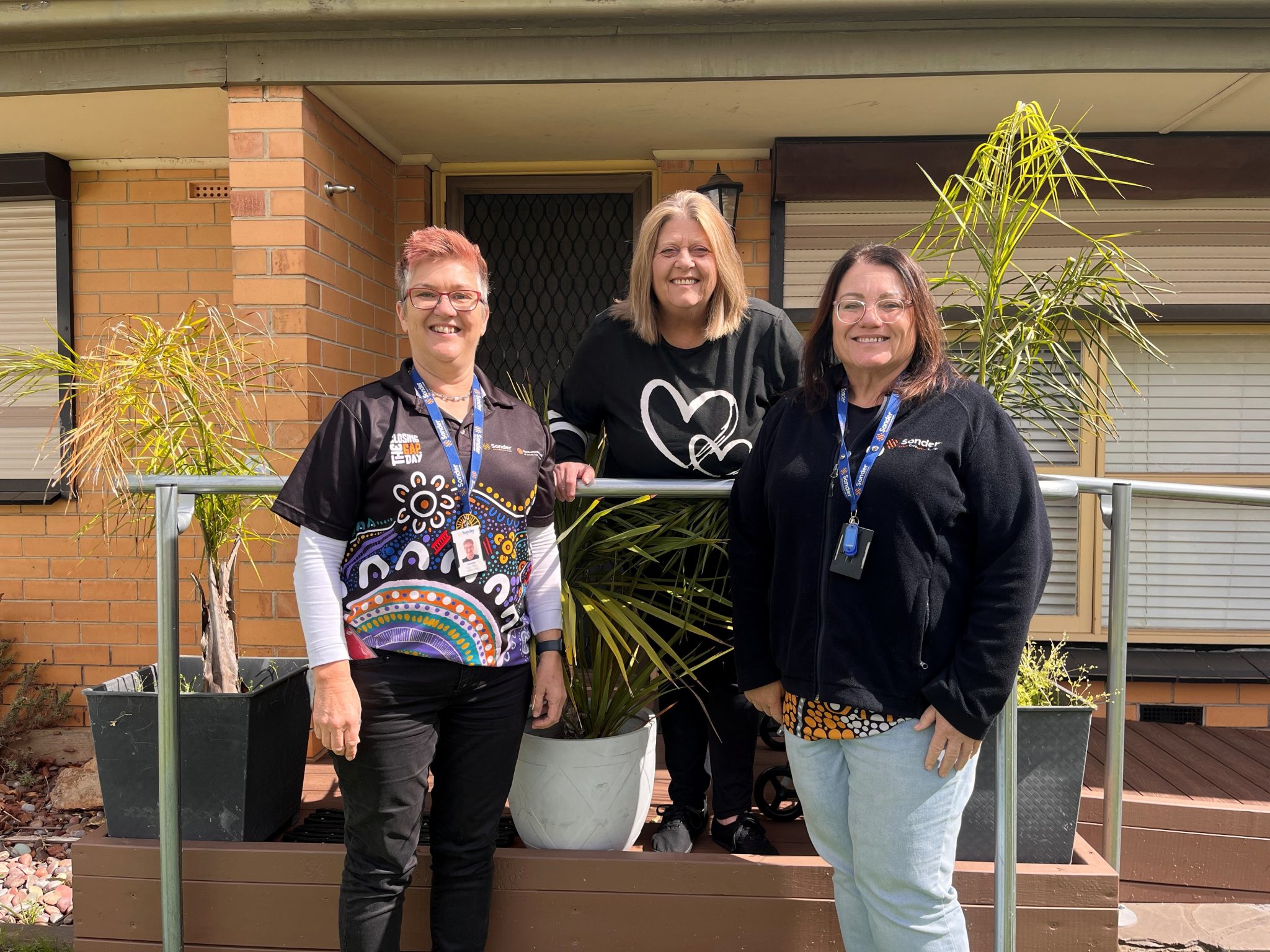 Debbie pictured between Carmen and April from Sonder's Closing the Gap - Integrated Team Care program. All smiling.